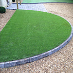 Artificial grass driveway 14mm single size gravel - close up