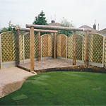 Loggia, chevron arch fencing and turf